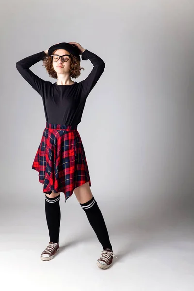 Young caucasian highschool girl posing in the studio — Stock Photo, Image