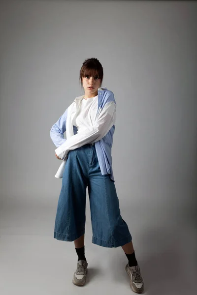 Young caucasian girl posing in the studio — Stock Photo, Image