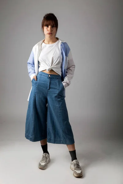 Young caucasian girl posing in the studio — Stock Photo, Image