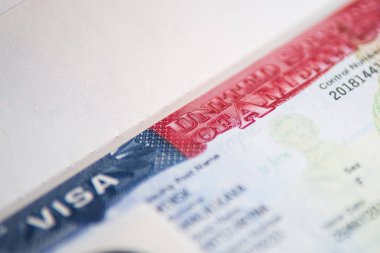 ABD vize arka plan. Bize pasaport yakın çekim perspektif görünüm seçici odak içinde vize.
