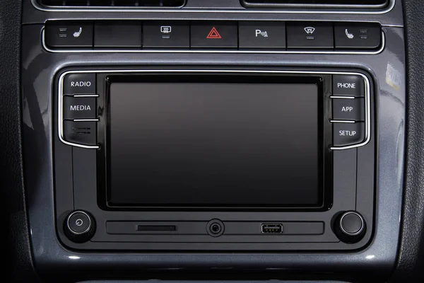 Car multimedia system with a large blank touch screen closeup. Design elements of a modern car.