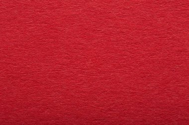 Koyu kırmızı kağıt doku veya arka plan. Boş koyu kırmızı sayfa.