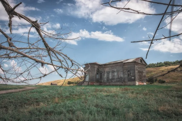 Abandoned old house on the hill. Mystical and mysterious atmosphere. Terrifying and frightening mansion.