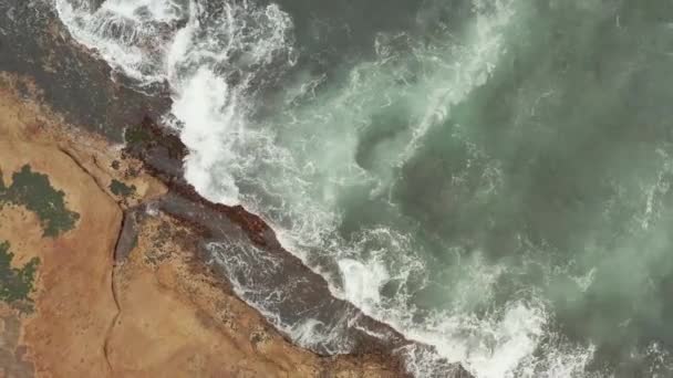 Aerial View Waves Breaking Rocks Showing Interesting Textures Colours — Stock Video