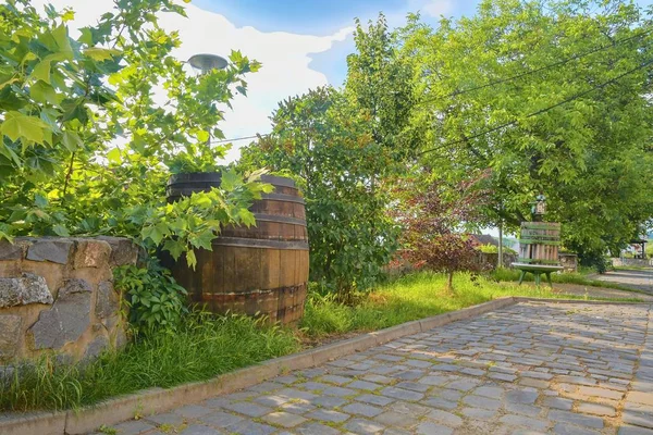 Old wine press and rustic wine barrel.. Wine background in Europe. Czech Republic, South Moravia