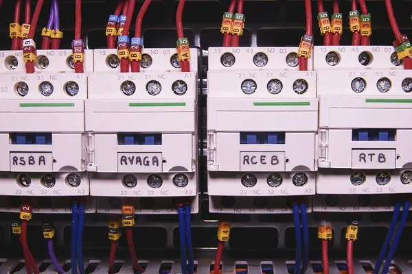Image shows control cubicle. Electric contactors inside power case