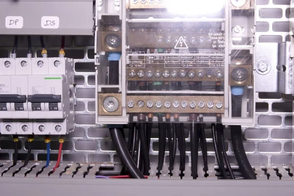 Image shows control cubicle. Circuit breakers and electric device inside power case