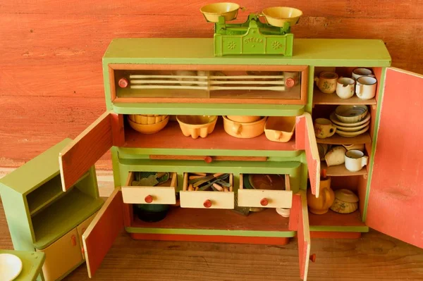 Vintage toys for girls. Wooden toy kitchen — Stock Photo, Image