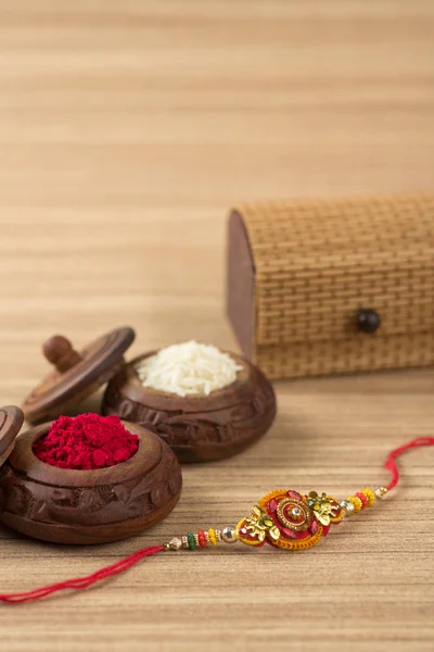 Indian Festival Raksha Bandhan Background Elegant Rakhi Rice Grains Kumkum — Stock Photo, Image