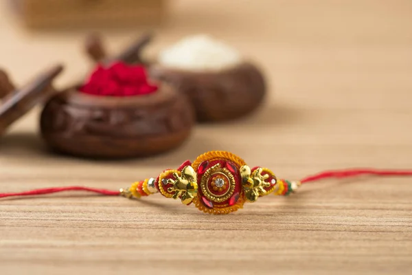 Індійський Фестиваль Raksha Bandhan Тло Елегантним Rakhi Rice Grains Kumkum — стокове фото