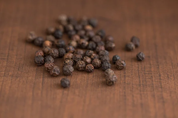 Close Black Pepper Peppercorns Wooden Background — Stock Photo, Image