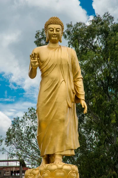 Statue of Buddha in sky background. Giant Buddha Statue.