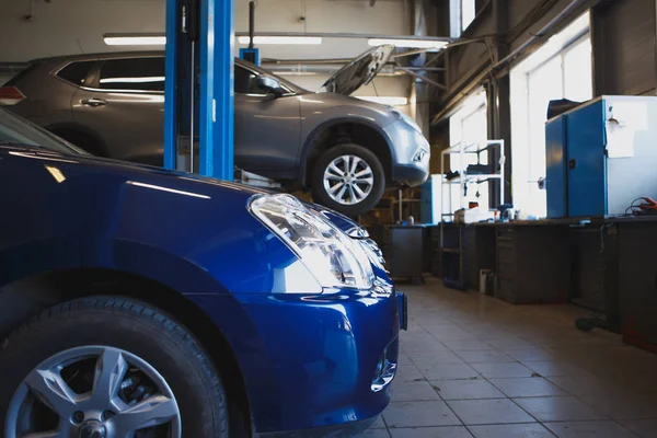 Auto reparation bensinstation suddig bakgrund — Stockfoto