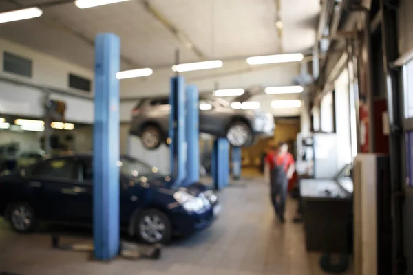 Auto reparation bensinstation suddig bakgrund — Stockfoto