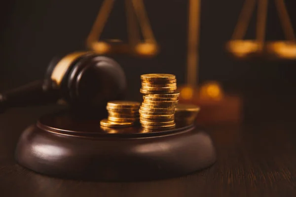 Legal gavel and coins in a coin jar — Stock Photo, Image