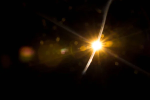 추상적 인 자연의 태양 플레어검은 위에 — 스톡 사진