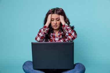 Stressed woman is having problems with computer. clipart