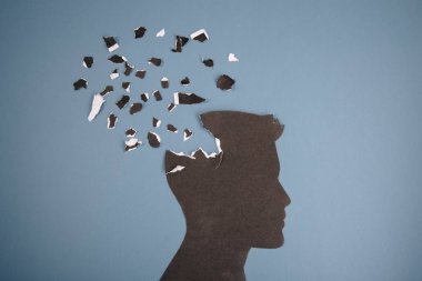 Beyin bozukluğu sembolü insan kafası tarafından sunulan form kağıdı yaptı. Alzheimer hastalığı, demans, hafıza kaybı için yaratıcı fikir ve ruh