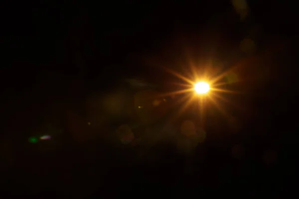 Résumé Éclat naturel du soleil sur le noir — Photo