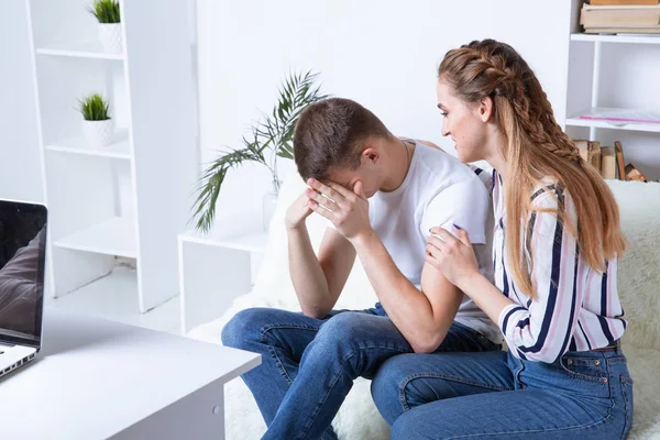 Upset male patient in the cabinet of psychologist.