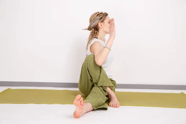 Female model in yoga pose in the studio. Young woman doing exercises. Relax — Stock Photo, Image