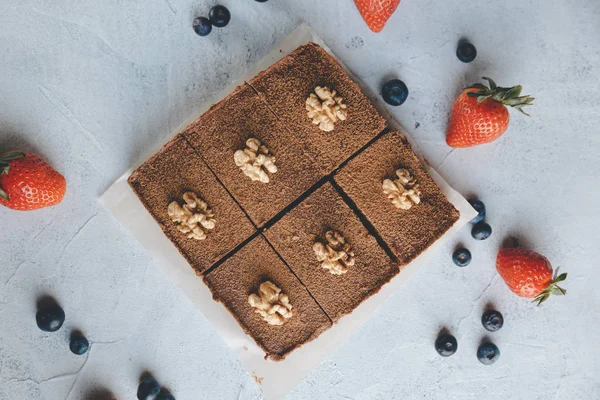 Vegan sweet potato brownie on white table. Healthy vegan food