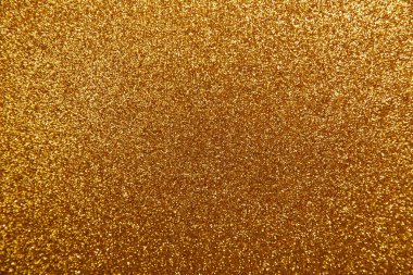 Altın parıldayan noel ışıkları. Bulanık soyut arkaplan