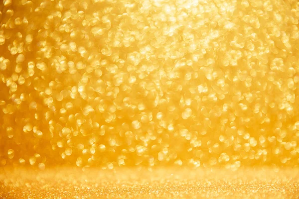 Altın parıldayan noel ışıkları. Bulanık soyut arkaplan — Stok fotoğraf