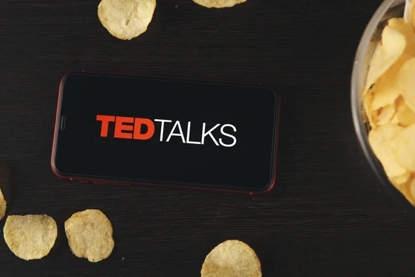 Tula Russia 07.05.2020 Ted Talks on the phone screen and snacks on the table. — Stok Foto