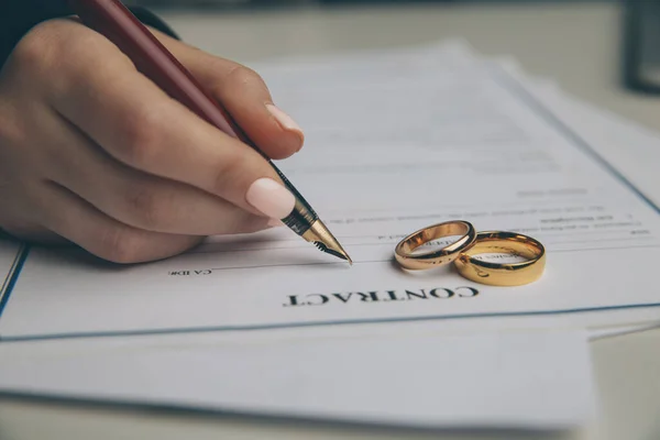 Woman signing marriage contract, closeup — Stock Photo, Image