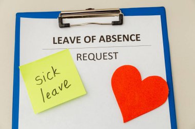 Personal leave ob absence statement form at the desk. clipart