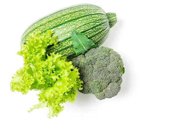 ズッキーニ レタス 白い背景の上のブロッコリー 緑の野菜 — ストック写真