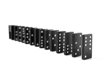 Black dominos on a white background.Board game, Hobbies and entertainment.