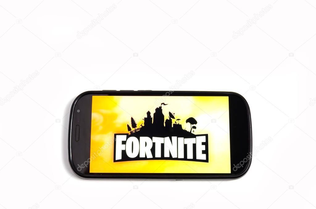 Kostanay, Kazakhstan, on white background mobile phone with image of popular game Fortnite.
