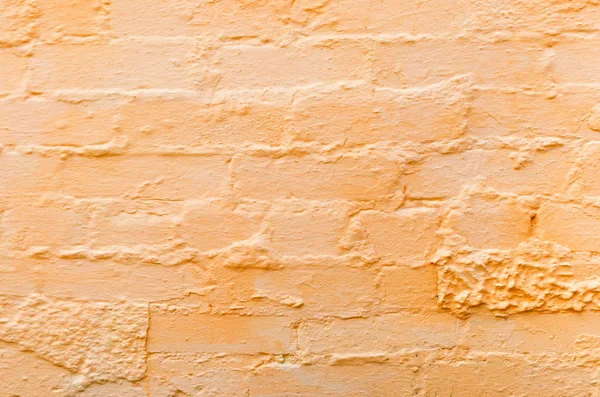 Tło ceglanego muru pomalowanego na pomarańczowo. Nowoczesny design. — Zdjęcie stockowe