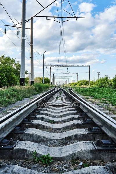Railway line splits into two tracks and goes into the distance