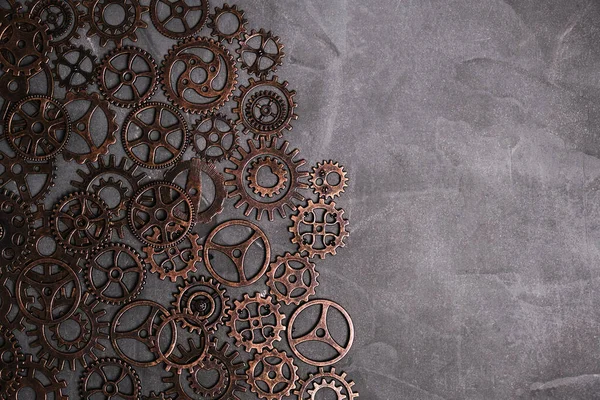 Lots of concrete-based gears.Background, gears and steampunk