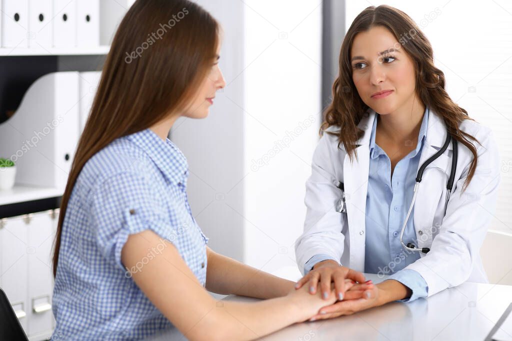 Doctor reassuring her female patient. Medical ethics and trust concept. Medicine and health care theme