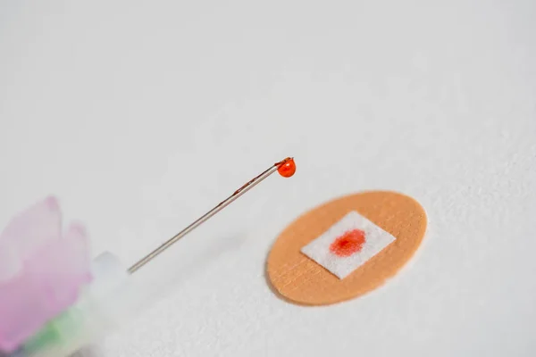 Drop Red Liquid Injection Needle Blood Plaster — Stock Photo, Image