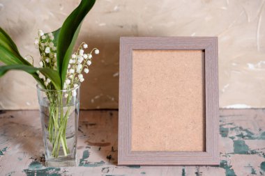 Vintage Fotoğraf buket vadideki zambak ve alan metin etkisi.