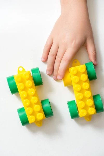 Child playing in the street with a color Designer. Kids activity in kindergarten — Stock Photo, Image