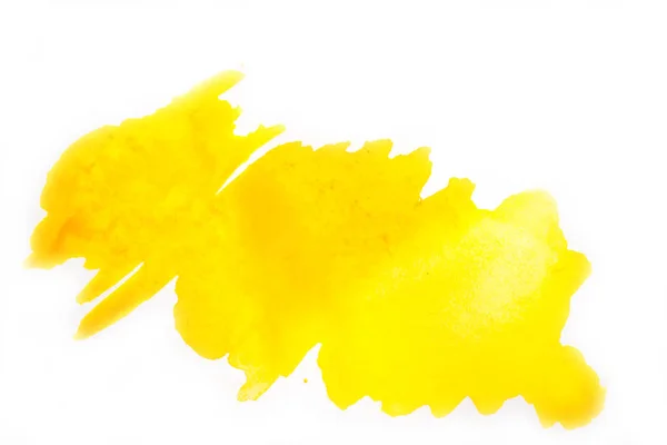 Mancha de acuarela amarilla sobre fondo blanco aislado. — Foto de Stock