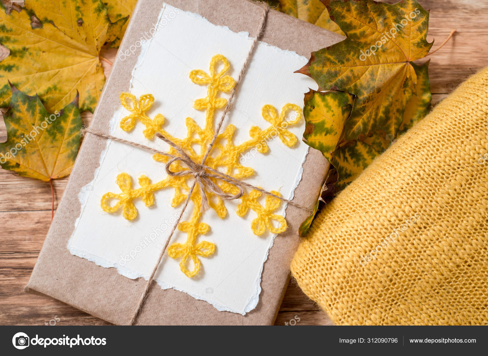 Download Gift Box In Kraft Packaging Mockup Torn Paper For Your Notes Autumn Bright Dry Leaves Yellow PSD Mockup Templates