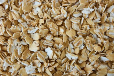 Cam kavanozda yulaf, kaşıkla yakın plan fotoğraf.