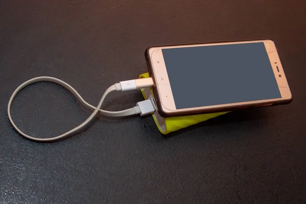 Mobile Phone is charged from power Bank, mobile electricity, standalone charger