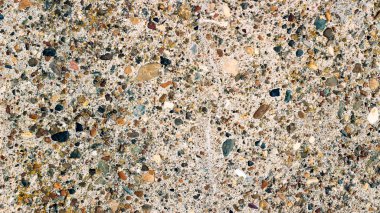 Çakıl veya çakıl taş duvar zemin renkli arka plan doku. Çakıl çakıl taşları farklı şekil kat doku arka plan olarak yapılmış duvar.