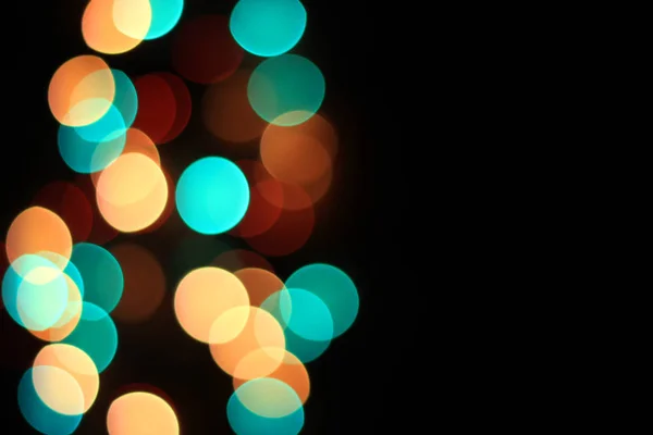 다양 한 다른 여러 가지 빛깔된 bubles 어두운 빛을 배경, 축제 및 celebreties 사진, 좋은 거품, 크리스마스 분위기, 새 해, 가까이 유명 인사 분위기, 다채로운 빛, 빛의 예술 — 스톡 사진