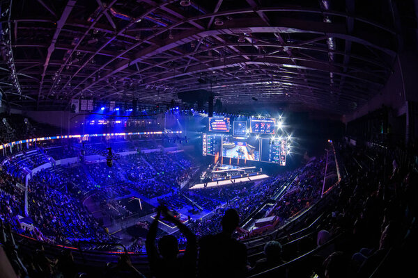 MOSCOW, RUSSIA - 14th SEPTEMBER 2019: esports Counter-Strike: Global Offensive event. Big illuminated main stage of a computer games tournament located on a big stadium. Tribunes are full of video