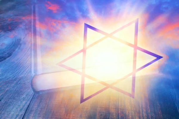 Torah book . Judaism church traditional symbols . Light from sky . Religion background . Judaism . way to the sky . Collection of Jewish Religious Objects
