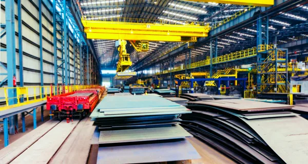 Industrial building interior . Industrial installations and pipelines . Interior of metallurgical plant workshop . Machine shop of plant